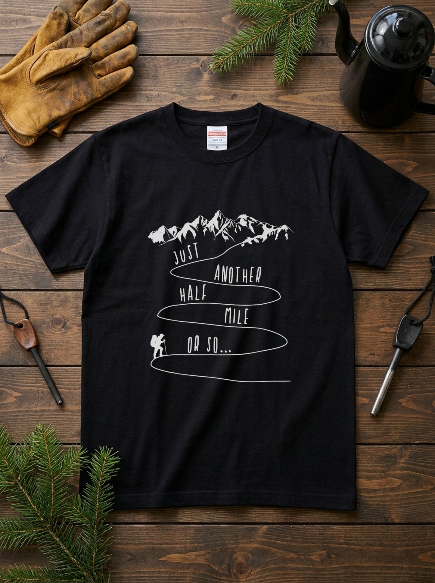 【Just Another Half Mile】あるある名言＆九十九折登山道 白線画 黒Tシャツ | CAMPMODE
